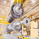 Illustration for article titled The Surprising Beauty of GEs Magnet Factories and Wind Turbines